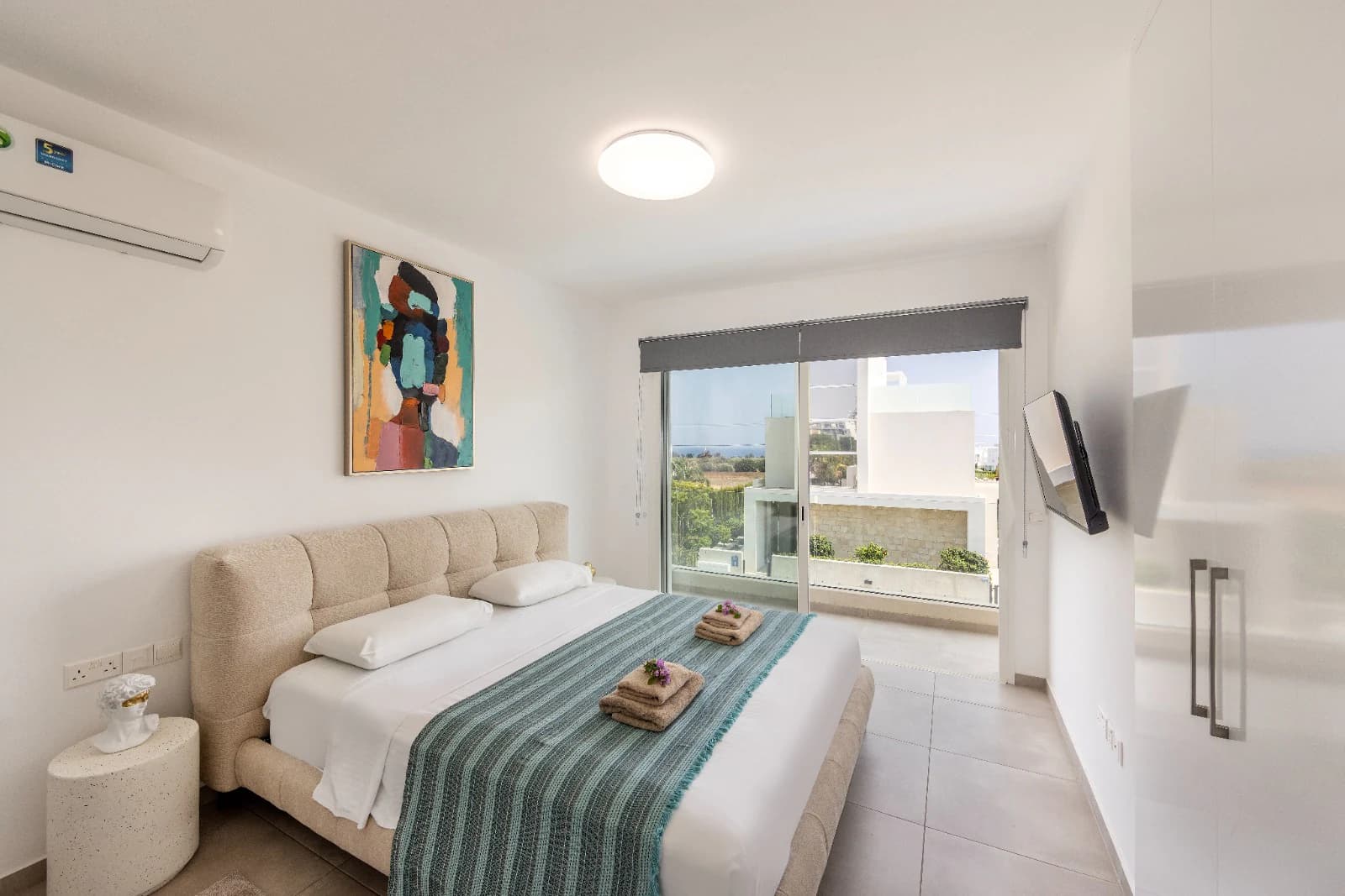 A double bedroom opening onto its own balcony.